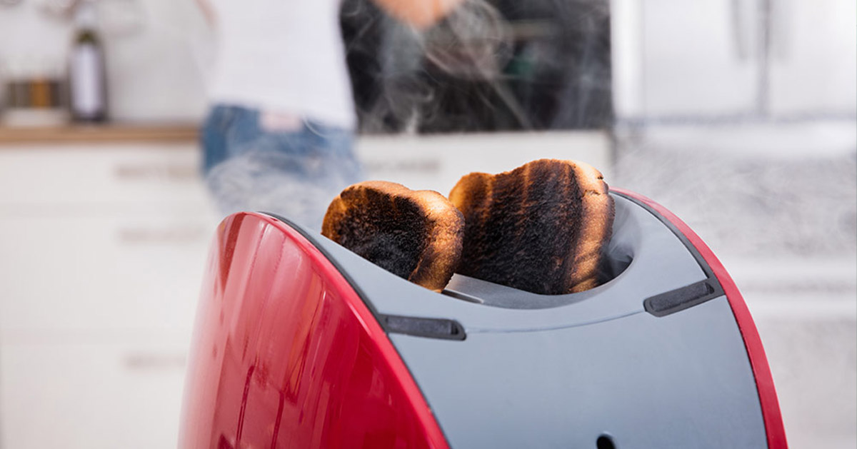 burned bread in a toaster