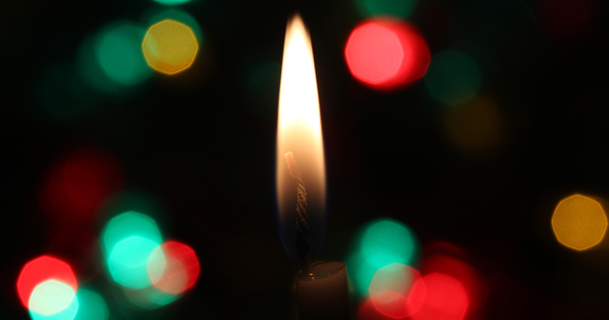 Candle Flame With Christmas Lights