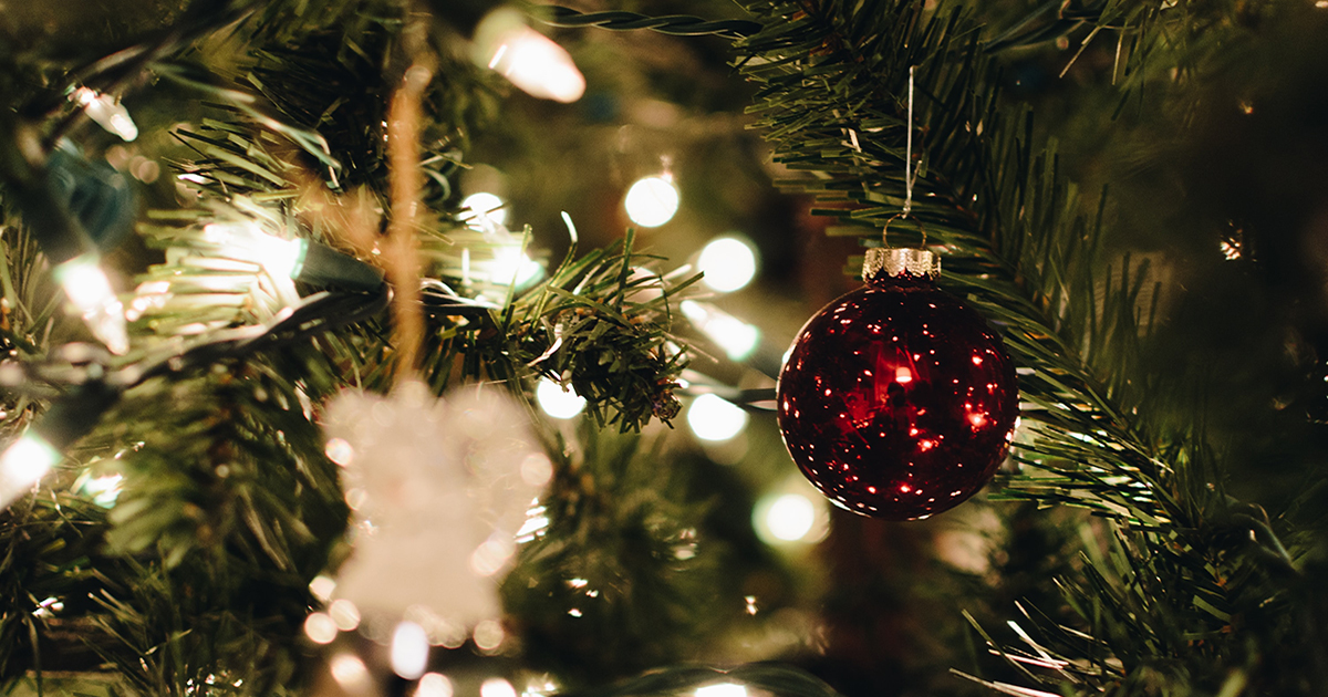 Close up of christmas tree lights and decorations - christmas light hazards